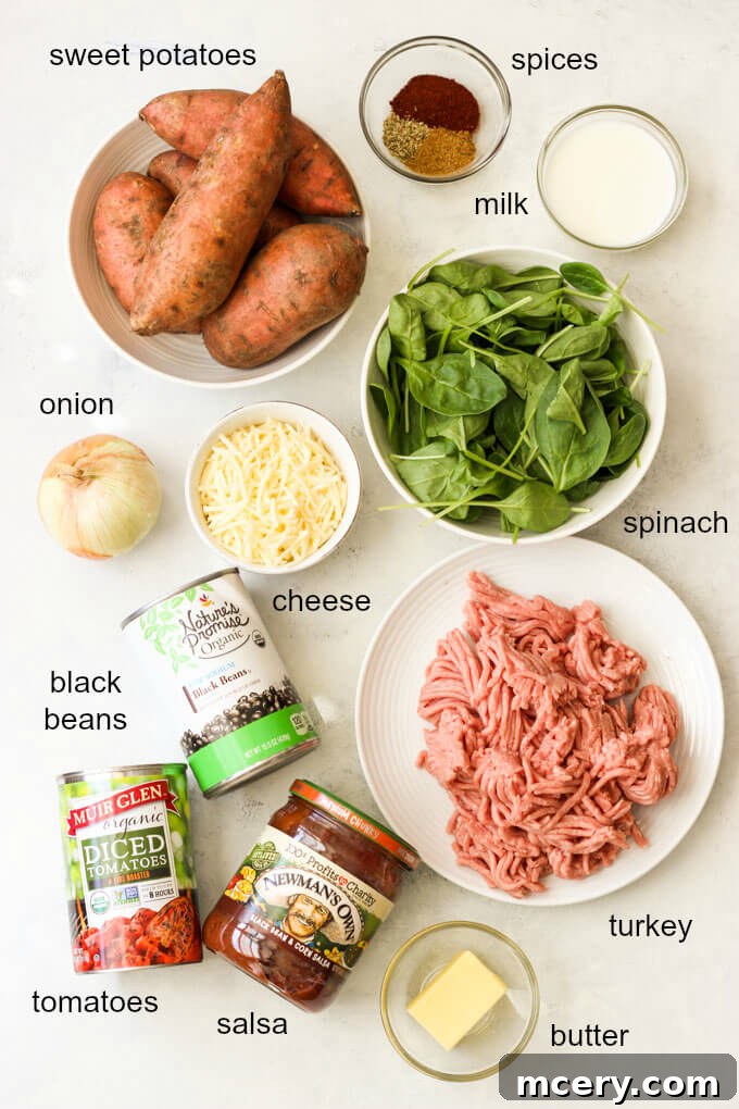 Golden Mash Comfort Bake 3 Assorted fresh ingredients for shepherd's pie, including sweet potatoes, ground turkey, black beans, tomatoes, and spices