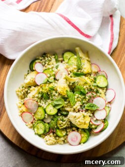 Overhead pearl couscous salad with spring vegetables