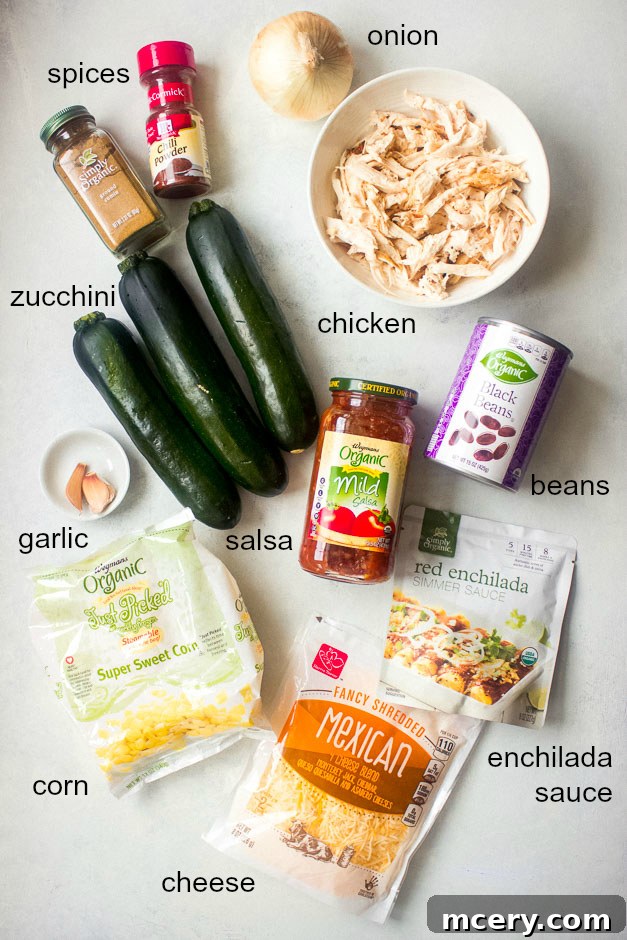 One Pan Zucchini Chicken Enchiladas 4 Ingredients for low-carb zucchini chicken enchiladas laid out on a table