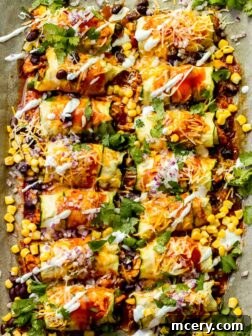 Overhead zucchini chicken enchiladas in sheet pan