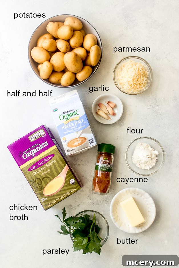 Ingredients for baby potatoes in cream sauce laid out on a surface