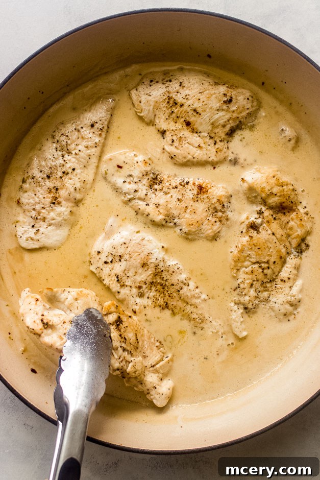 Creamy Coconut Chicken Skillet 10 Seared chicken breasts returned to the pan, simmering in the creamy coconut lime sauce.