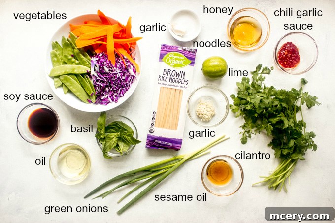 Vibrant Cold Noodle Bowl 4 assorted fresh ingredients for rice noodle salad, including rice noodles, vegetables, and herbs