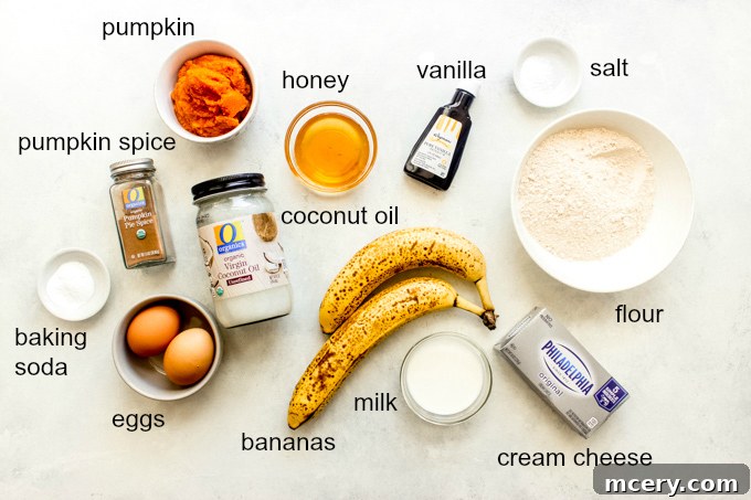 Spiced Pumpkin Cream Cheese Swirl Muffins 4 Assorted ingredients for pumpkin muffins laid out on a table