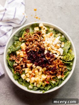 spinach salad in a bowl, top-down view