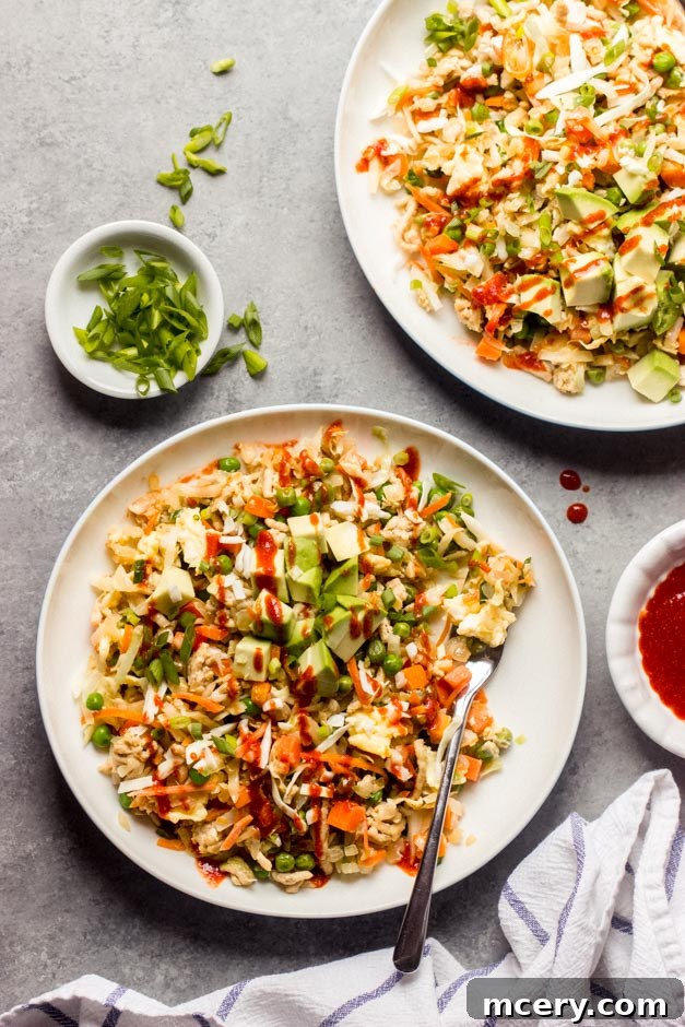 Golden Chicken Cabbage Wok Delight 2 Flavorful Chicken Cabbage Stir Fry, a low-carb alternative to fried rice, featuring chicken, vegetables, and egg.