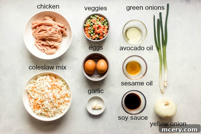 Golden Chicken Cabbage Wok Delight 4 Fresh ingredients laid out for making chicken and cabbage stir fry, including ground chicken, coleslaw mix, eggs, and frozen vegetables.
