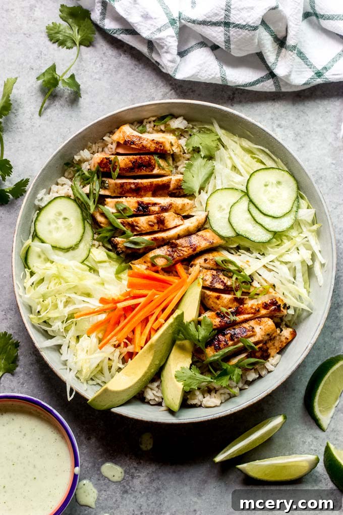 Grilled Chicken Spring Roll Salad Bowl 2 Delicious spring roll bowl with succulent grilled chicken, vibrant vegetables, and a creamy cilantro lime dressing.