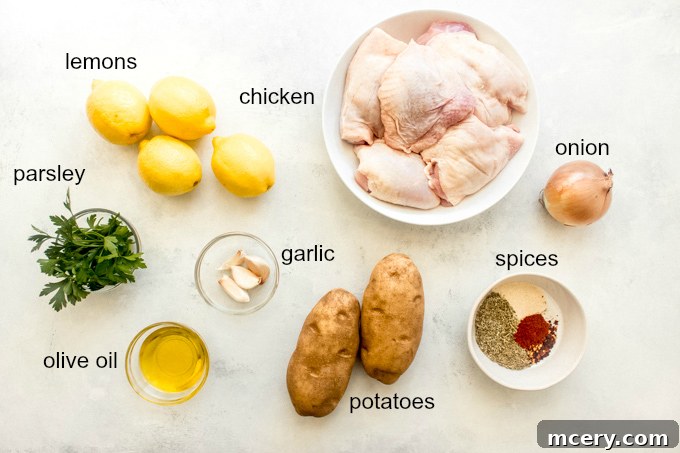 Zesty Lemon Herb Roasted Chicken and Golden Potatoes 4 A vibrant display of fresh ingredients for lemon roasted chicken: olive oil, lemons, garlic, a variety of spices, chicken thighs, potatoes, and an onion