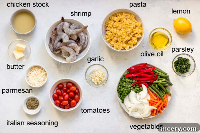 Zesty Shrimp and Spring Vegetable Pasta 3 Assortment of fresh ingredients for Shrimp Pasta Primavera, including shrimp, various vegetables, pasta, and herbs.