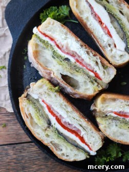 Eggplant, Prosciutto and Pesto Pressed Sandwich - homemade pesto and melt in your mouth prosciutto are just a few layers of this Italian inspired sandwich that's perfect as a lunch or appetizer