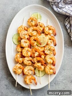 A bowl of delicious grilled garlic shrimp, highlighting the rich colors and textures.