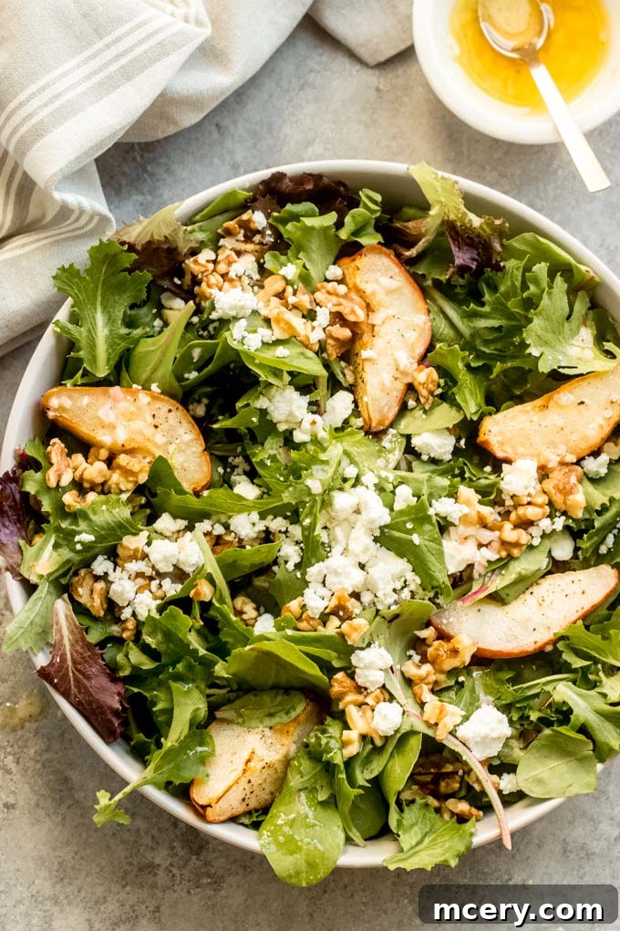 Caramelized Pear & Chevre Salad 2 Exquisite fall salad with roasted pears, creamy goat cheese, toasted walnuts, and a bright lemon vinaigrette dressing