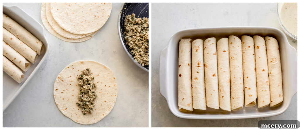 Savory Chicken Enchilada Bake 7 Rolled up chicken enchiladas neatly arranged seam-side down in a baking dish