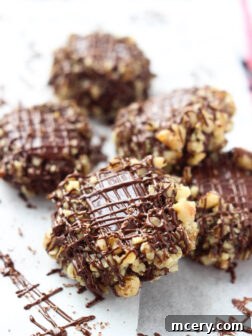 Day 9 of 12 Days of Cookies: chocolate thumbprint cookies with raspberry-caramel filling are a MUST this holiday season. Super soft, sophisticated and tastiest cookie ever! | littlebroken.com @littlebroken