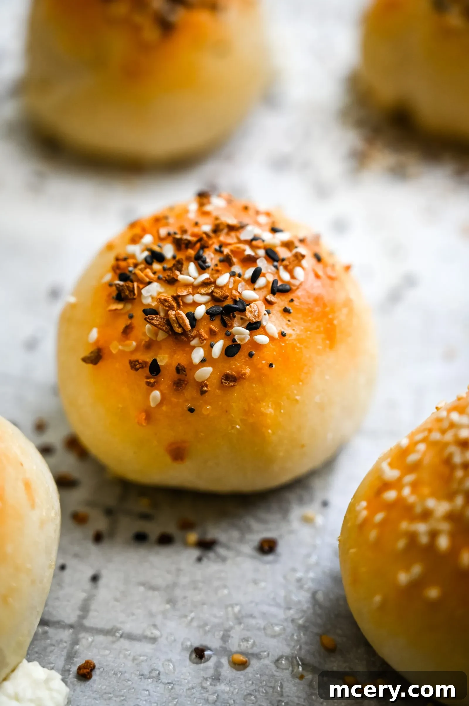Bagel Bombs 13 A close-up of a perfectly baked stuffed bagel bite, showcasing its golden crust and delicious appearance.