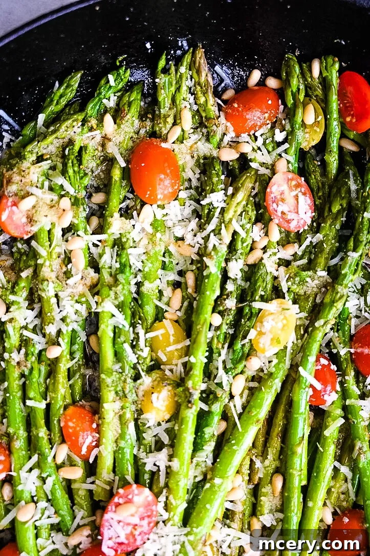 Bright and Speedy Lemon Garlic Asparagus 5 Lemon Garlic Asparagus served on a plate with fresh lemon