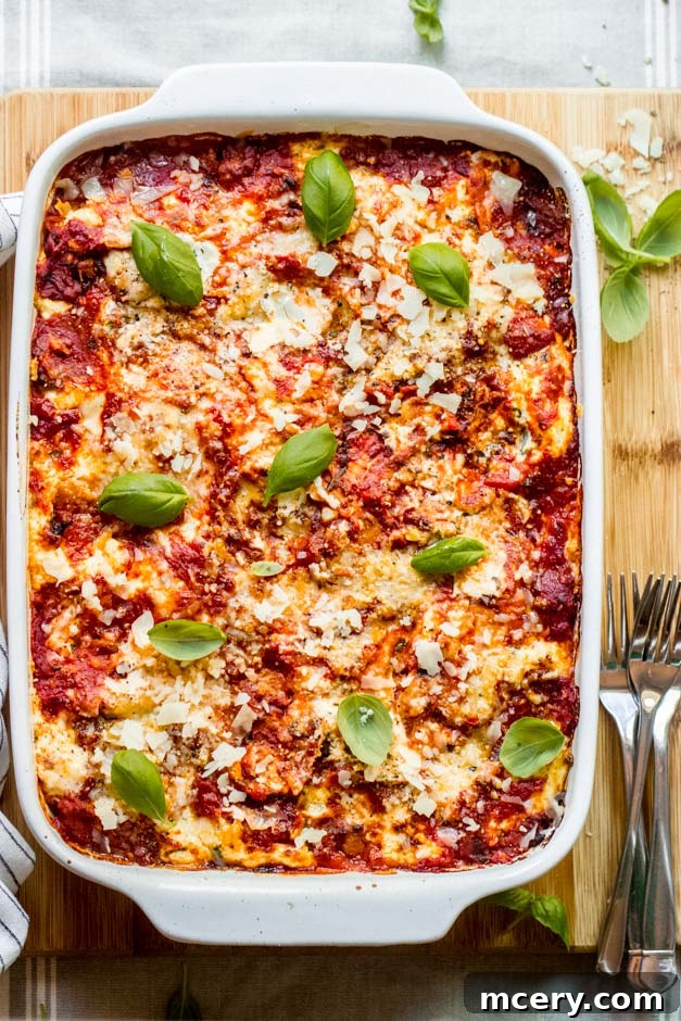 Barefoot Contessa's Turkey Lasagna 2 overhead of ina garten lasagna in white casserole dish.