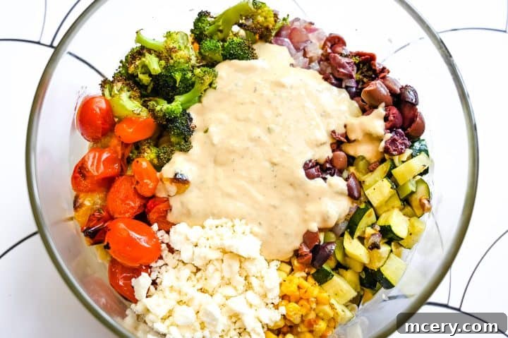 Mediterranean Hummus Pasta Delight 3 Hummus Pasta Salad with colorful fresh vegetables.