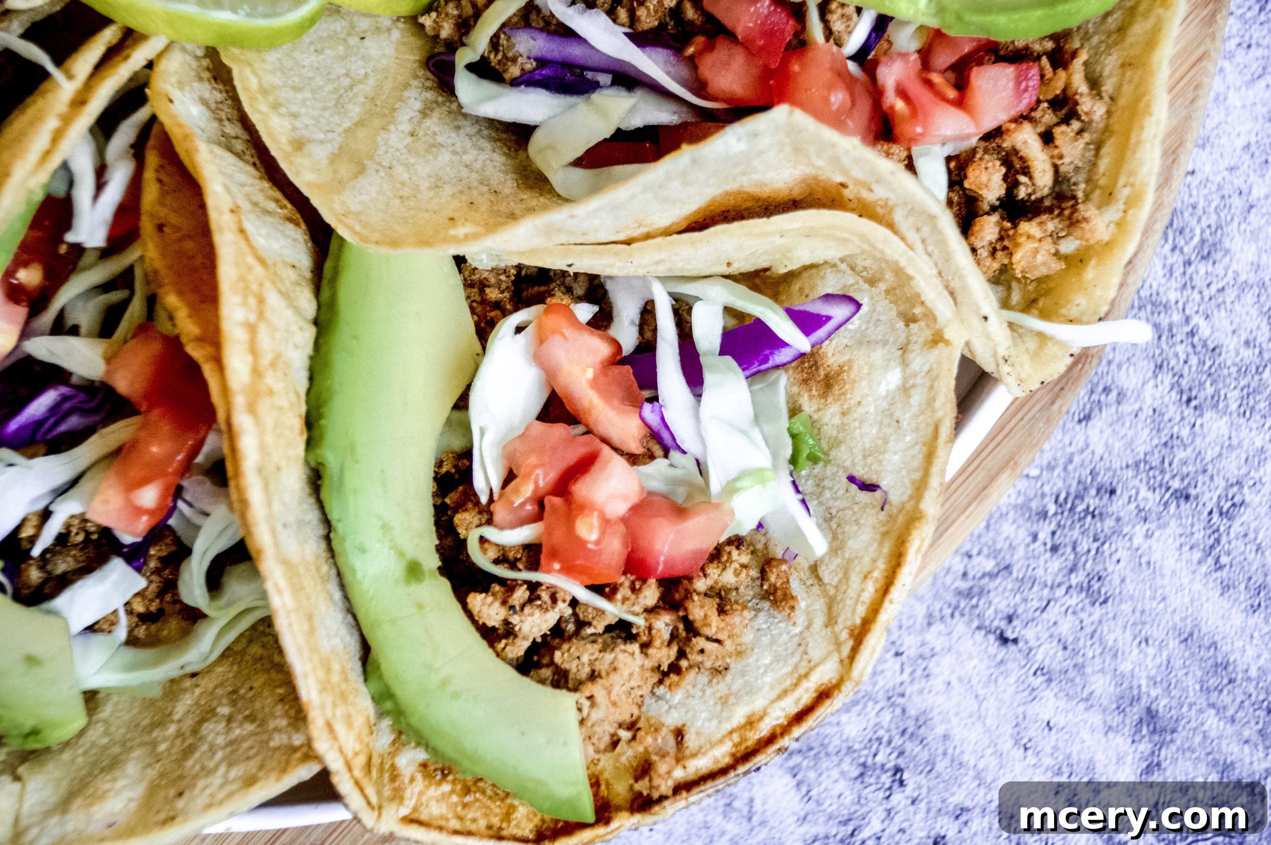 Flavorful & Fast Turkey Tacos 9 A close-up of a beautifully garnished ground turkey taco, highlighting the fresh toppings.