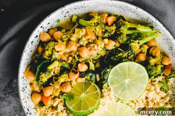 Garnished bowl of 15-Minute Chickpea Curry and Quinoa