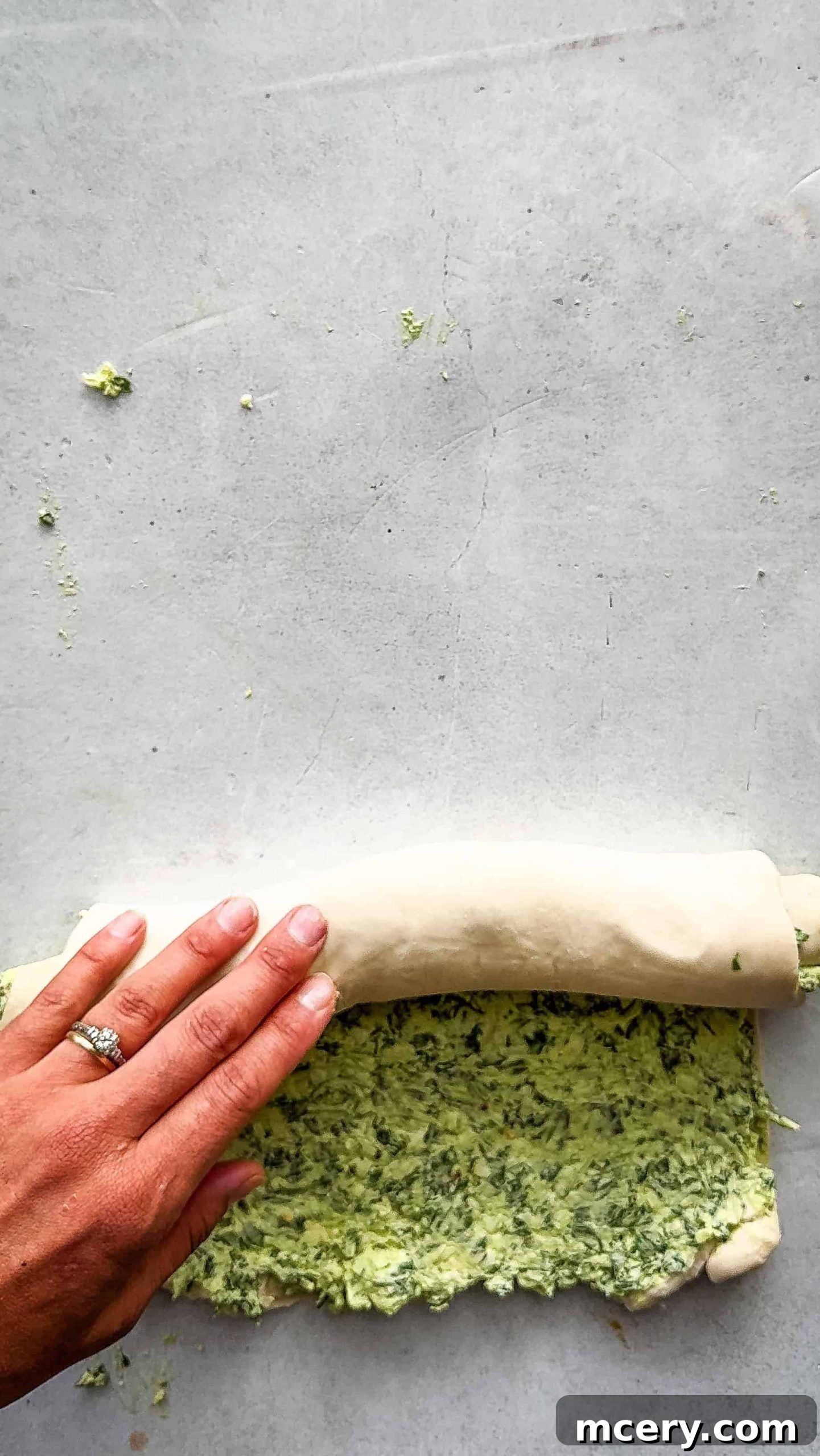Savory Spinach and Cheese Puff Pastry Swirls 8 Freshly baked spinach and cheese pinwheels on a cooling rack