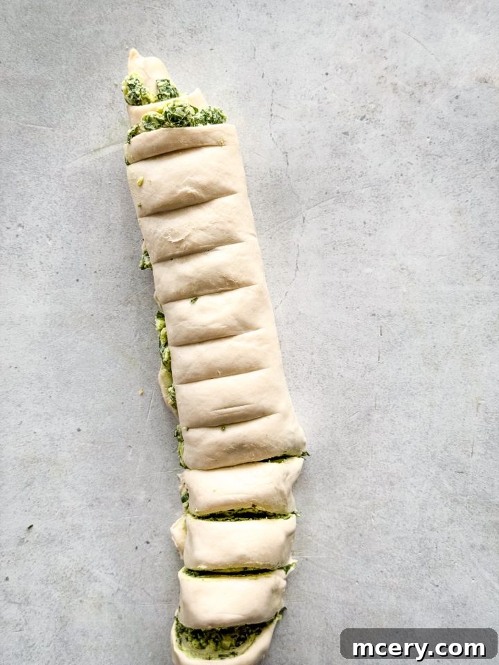 Savory Spinach and Cheese Puff Pastry Swirls 9 Overhead view of spinach and cheese pinwheels ready to serve