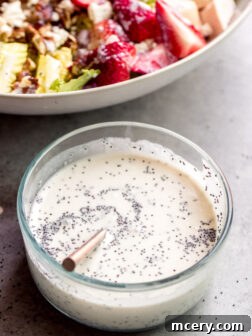 Homemade Poppy Seed Dressing in a small bowl, perfect for salads