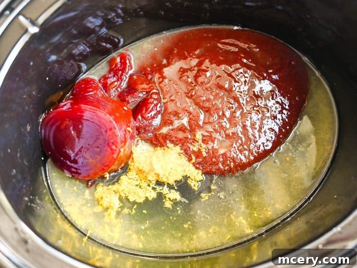 Cranberry Glazed Holiday Meatballs 4 Step 1: Frozen meatballs are placed in a slow cooker.