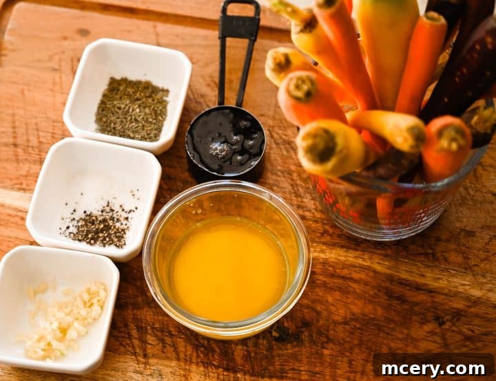 Ingredients for honey butter roasted carrots arranged on a wooden surface, including fresh carrots, melted butter, honey, herbs, and seasonings.