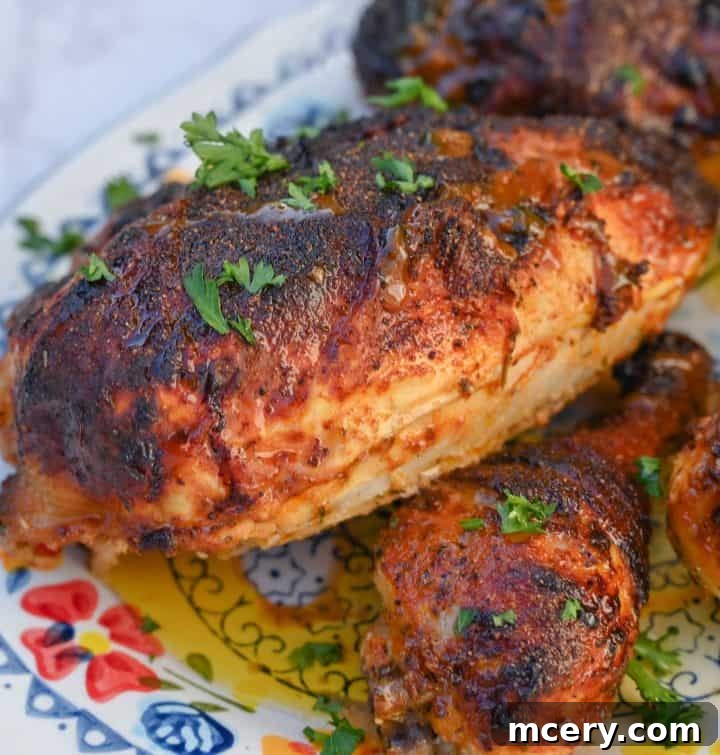 A full plate of buttermilk chicken, garlic butter, and hot honey, ready to eat.