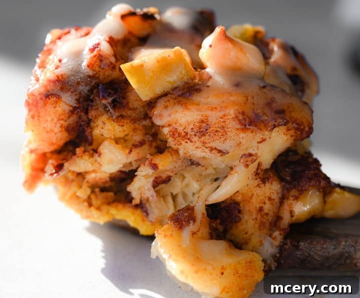 Golden Apple Cinnamon Pull-Apart Bake 2 Delicious Apple Cinnamon Roll Bake fresh out of the oven, golden brown and bubbly.