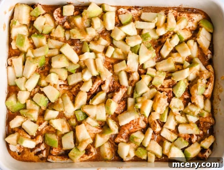 Golden Apple Cinnamon Pull-Apart Bake 12 Close up of a single serving of Apple Cinnamon Roll Bake.