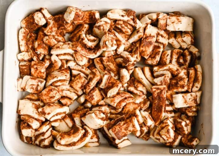 Golden Apple Cinnamon Pull-Apart Bake 10 Baked Apple Cinnamon Roll Bake fresh from the oven, before icing.