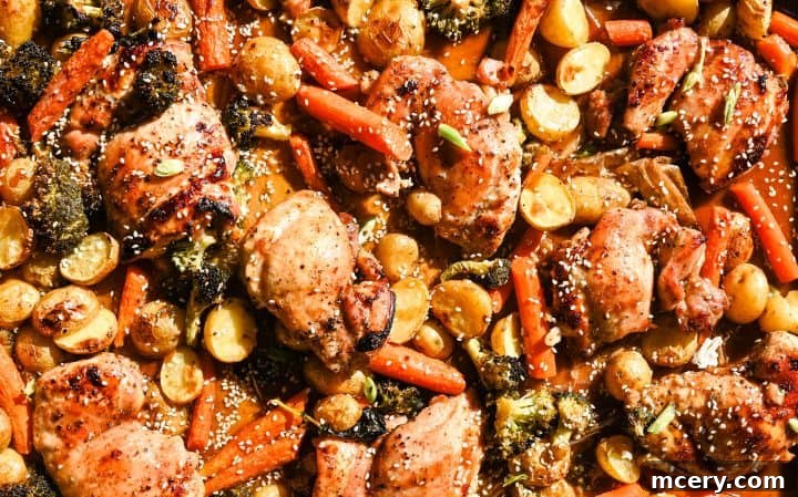 Sticky Honey Garlic Chicken and Roasted Vegetables 8 Close-up of roasted chicken and potatoes