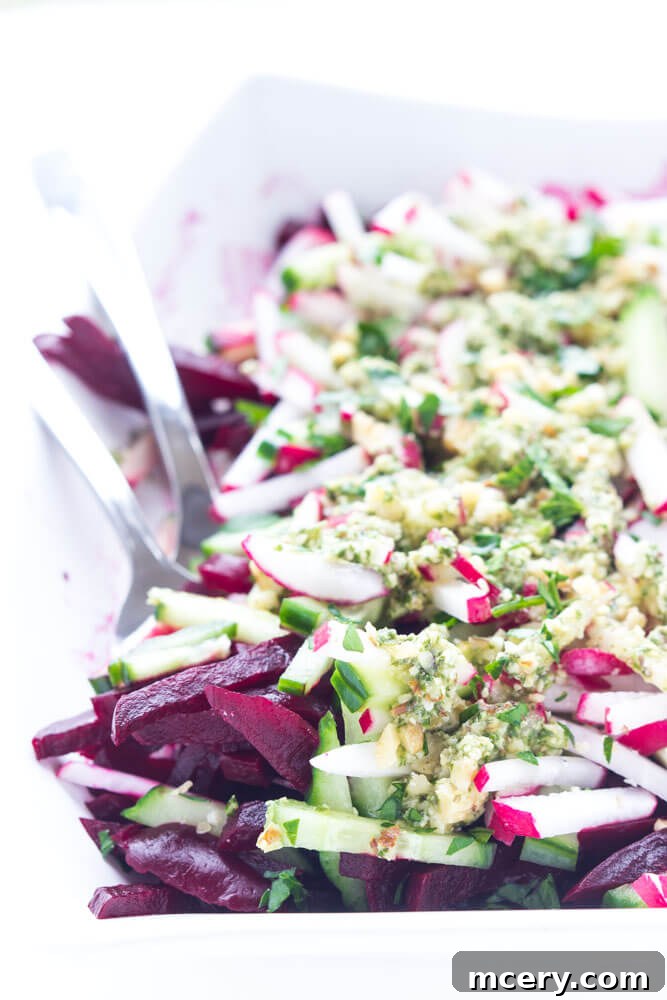 Ruby Root and Cucumber Delight with Basil Pesto Vinaigrette 3 Colorful and easy Beet, Cucumber, and Radish Salad tossed in a homemade basil pesto vinaigrette
