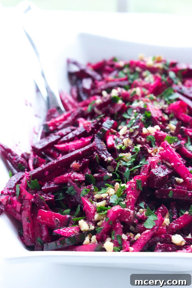 Ruby Root and Cucumber Delight with Basil Pesto Vinaigrette 5 Hand julienning fresh beets for the healthy Beet, Cucumber, and Radish Salad