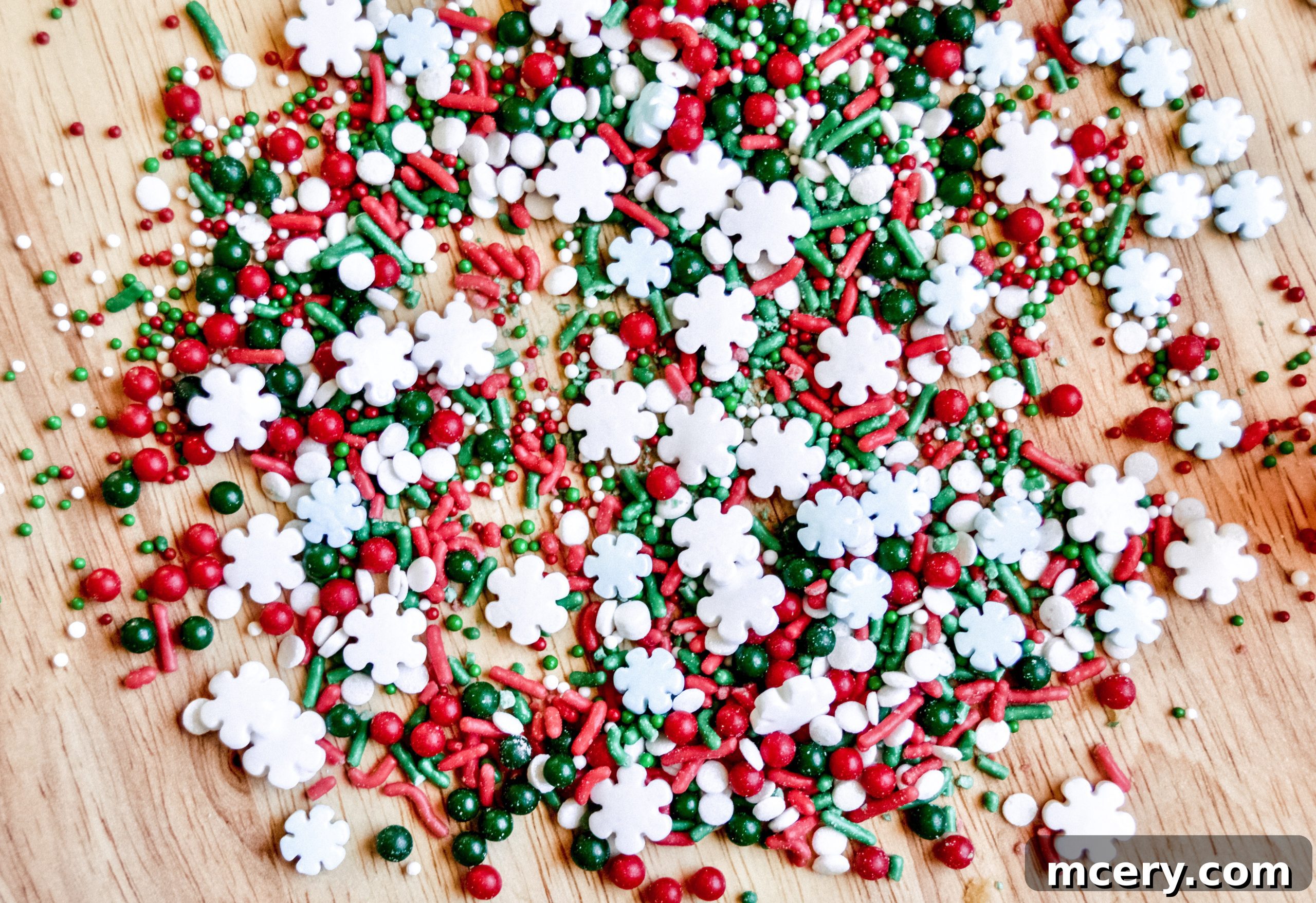 Guilt-Free Paleo Vegan Cut-Out Sugar Cookies 5 A close-up overhead shot of the raw paleo cookie dough, perfectly rolled out on a light surface, with various cookie cutters ready to make festive shapes.