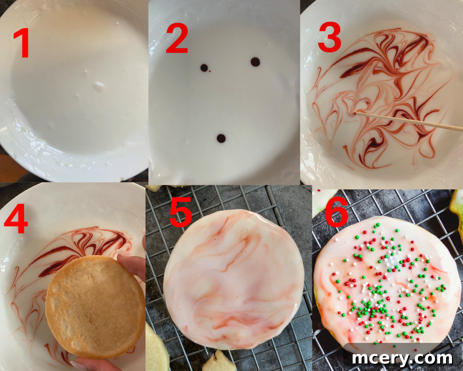 A variety of beautifully decorated sugar cookies with marble glaze, showing different colors and patterns, arranged artfully.