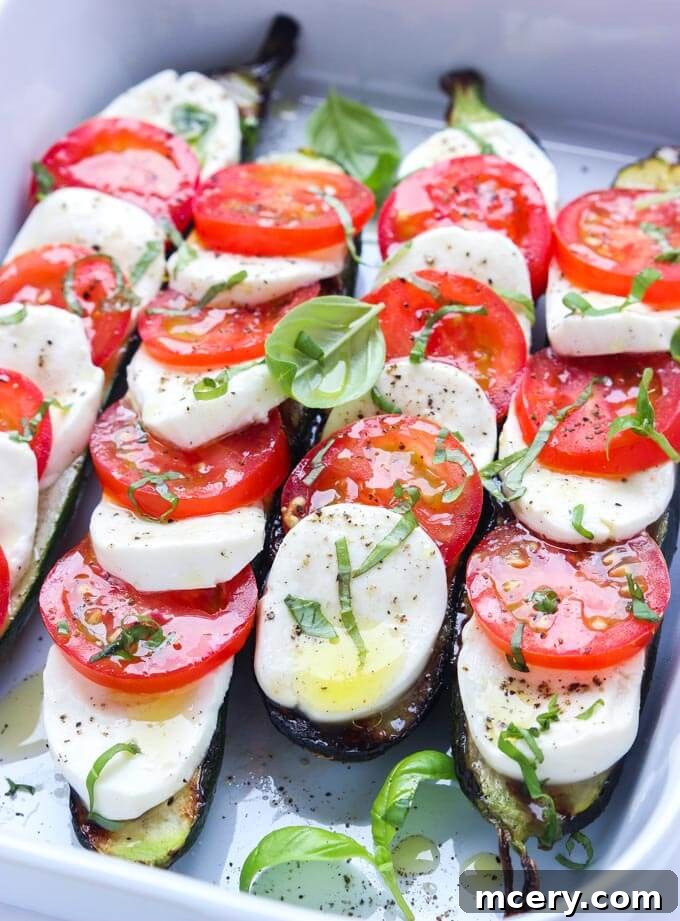 Zucchini Mozzarella Melt 2 Grilled zucchini with fresh mozzarella, ripe tomatoes, and fragrant basil leaves