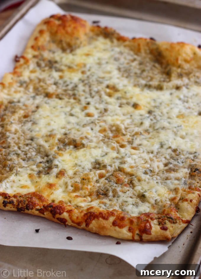 The Green Goddess Pizza 3 Baked puff pastry pizza base with pesto and melted cheese