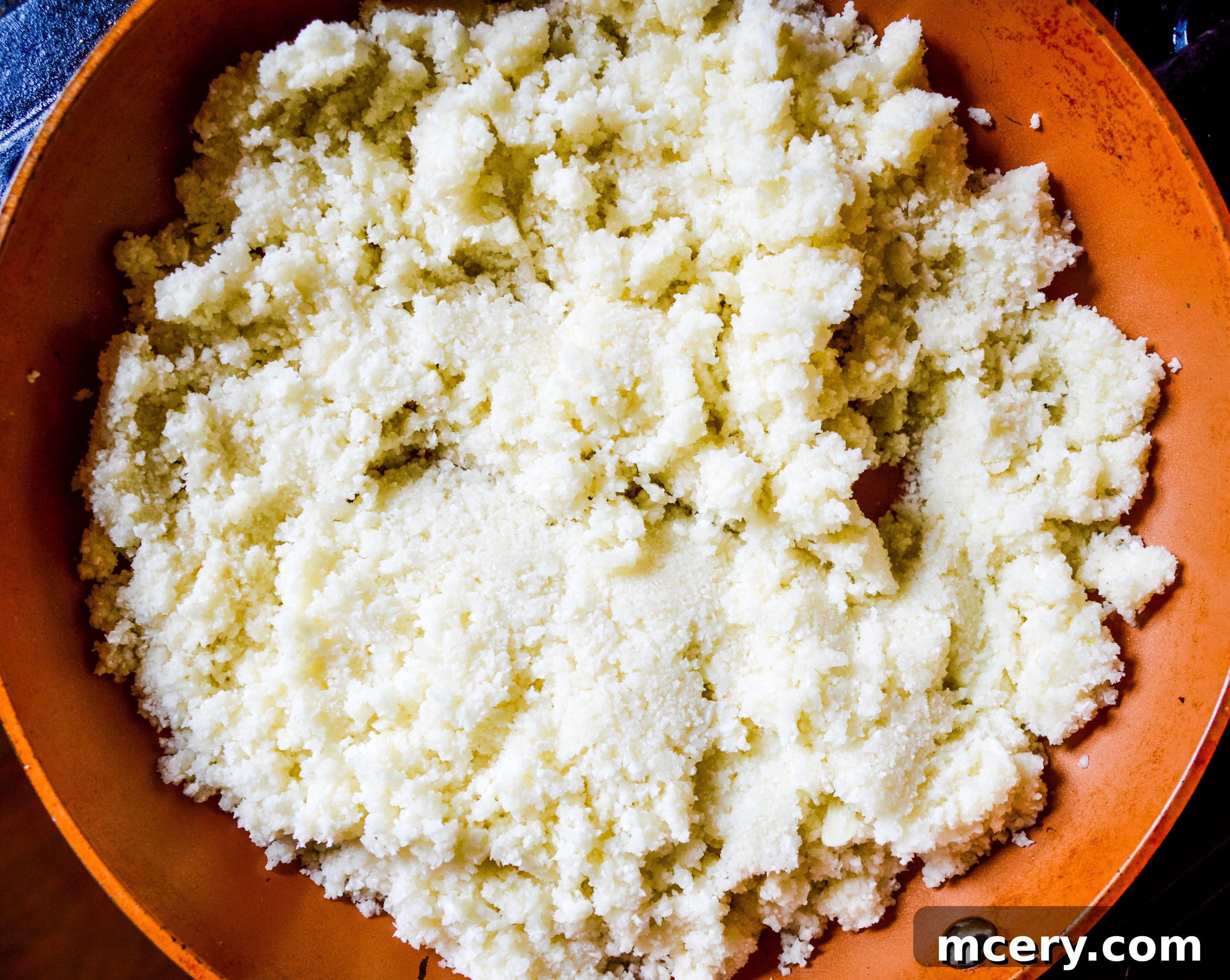 The Ultimate Cauliflower Pizza Base 8 Steamed cauliflower rice ready to be drained.