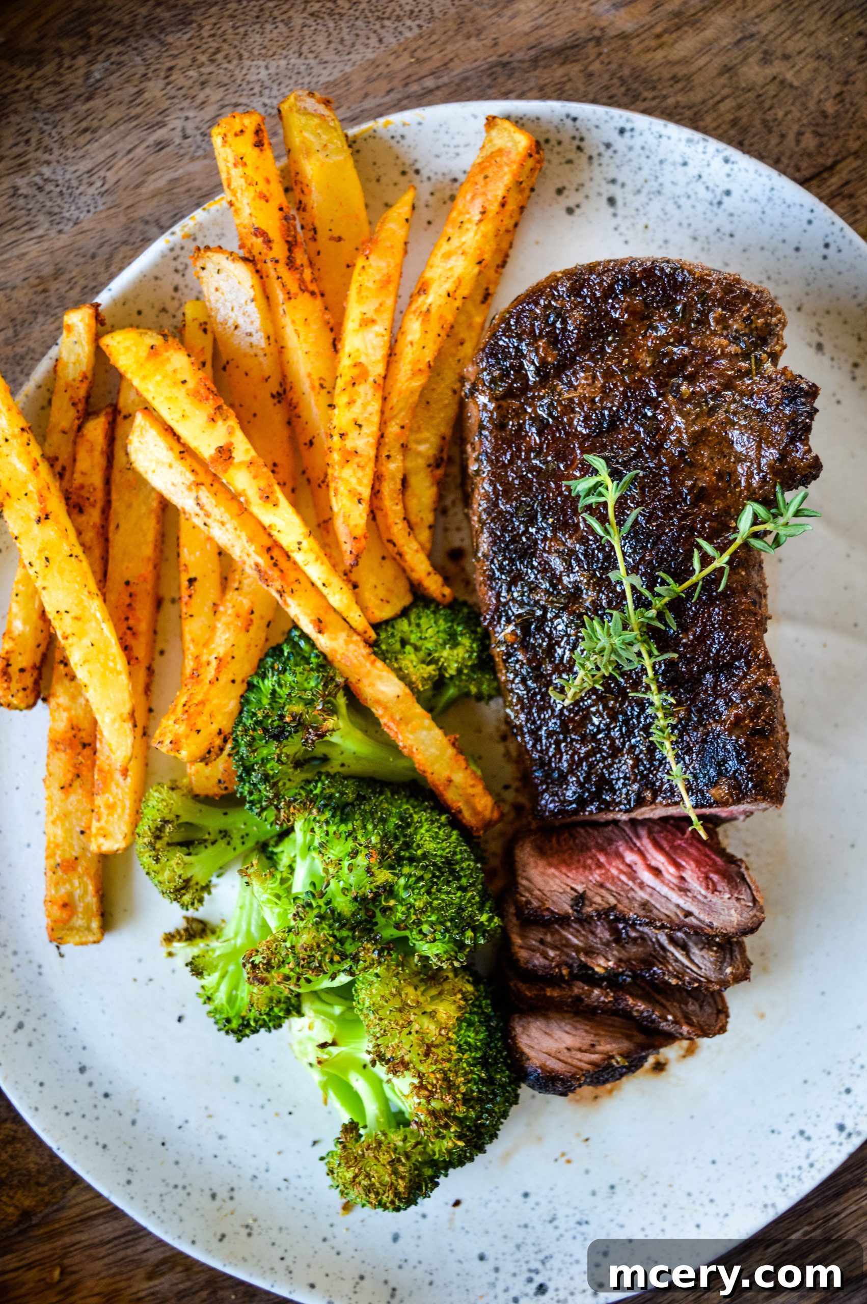 Elevate Your Steak The Ultimate Marinade Secret 3 Close-up of marinated steak in a bowl, showing the rich dark marinade