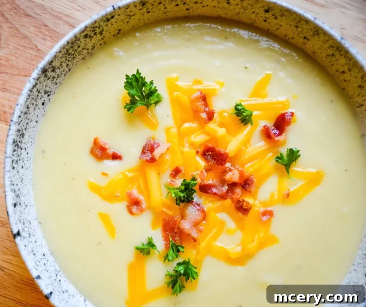 Cauliflower Cheese Soup in a bowl ready to be served
