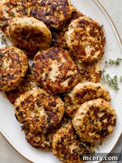chicken apple sausage on a white oval platter.