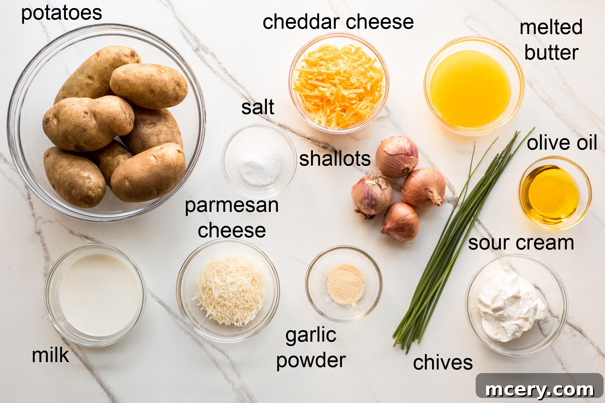 Ultimate Cheesy Baked Mash 3 ingredients for baked mashed potatoes arranged on a surface