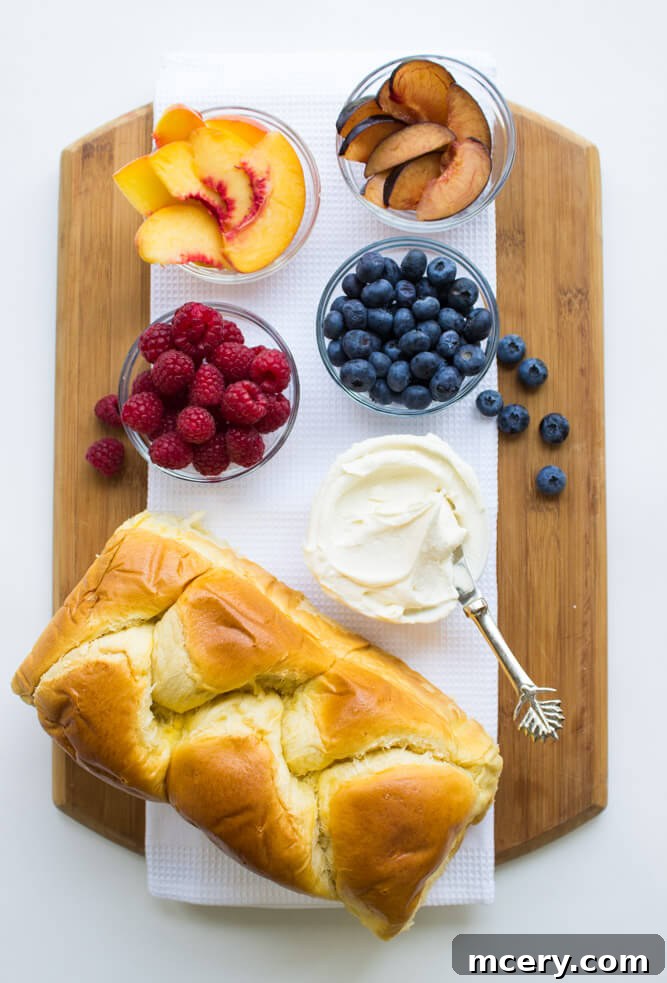 Artisan Fruit Toast 2 Luscious honey-vanilla flavored mascarpone ricotta spread on pillowy soft French Brioche toast and topped with fresh fruit, ready to be enjoyed as a delightful breakfast.