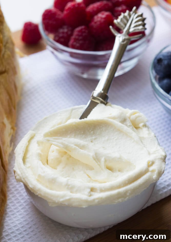 Artisan Fruit Toast 4 A bowl filled with the creamy mascarpone ricotta spread, ready to be used as a topping for fresh fruit toast.