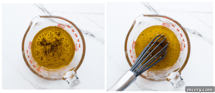 Homemade salad dressing in a measuring cup