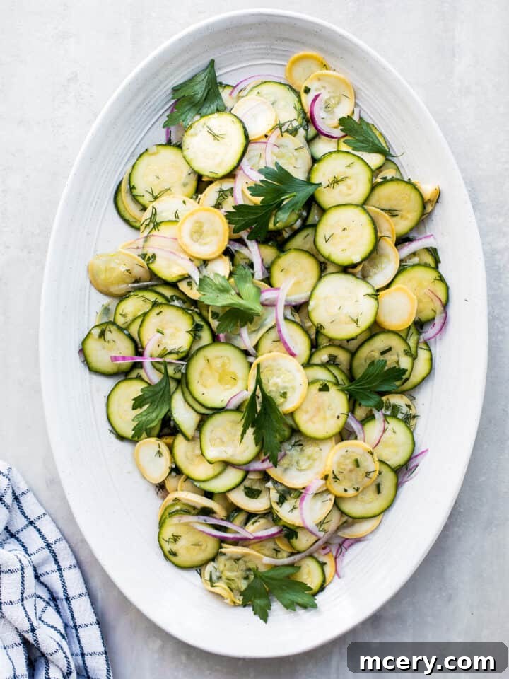 Marinated summer squash salad recipe with zucchini, onions, and simple marinade